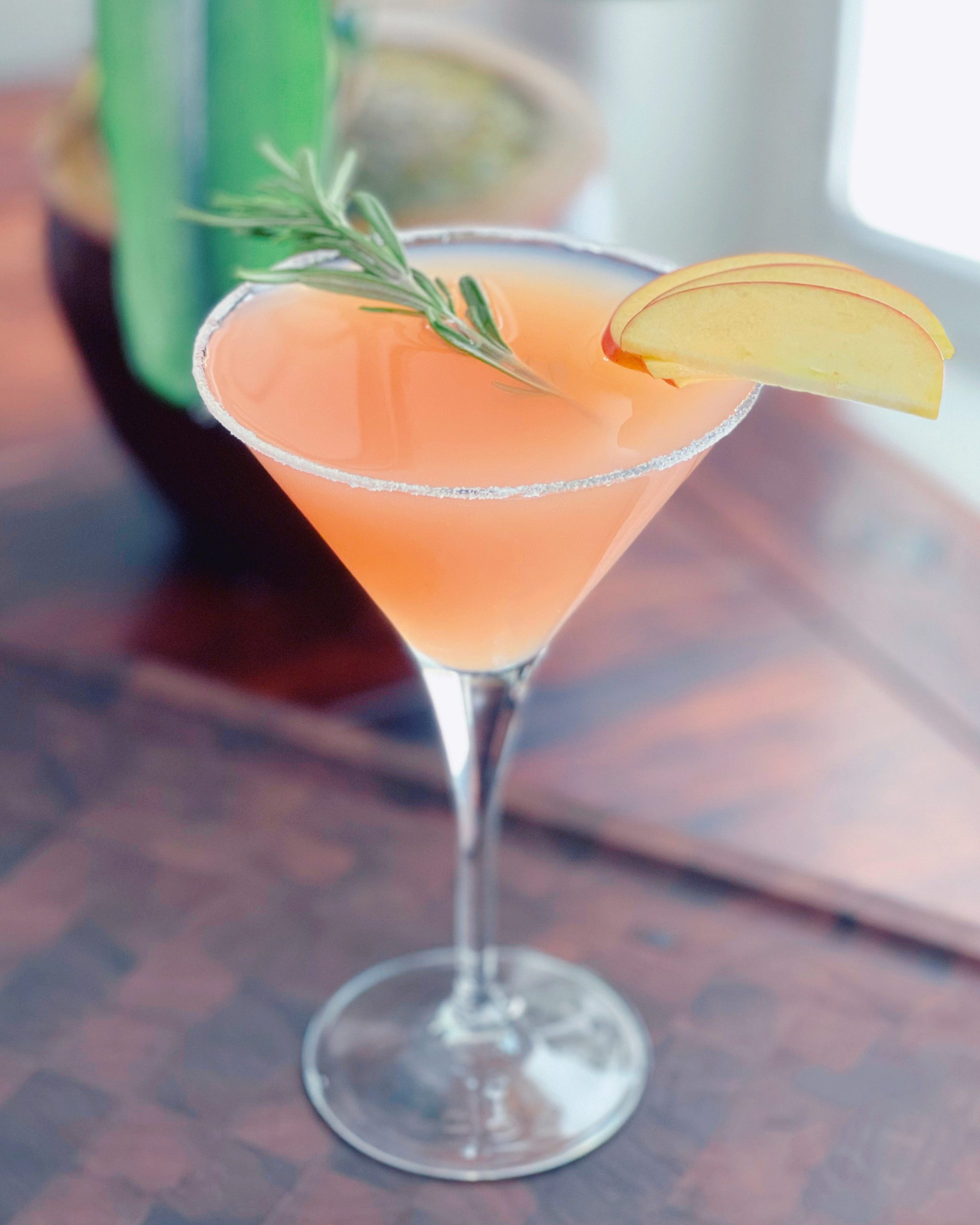 Apple Drink with Rosemary in Martini Glass Apple Drink with Rosemary in Martini Glass