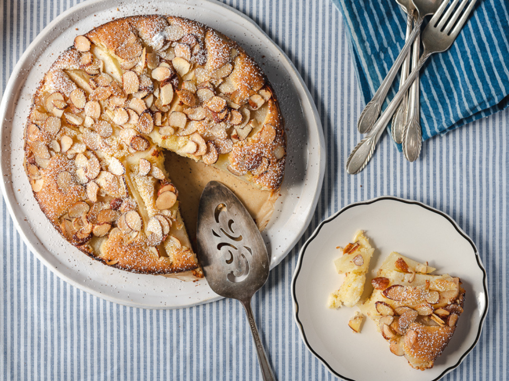 Italian Pear Almond Cake on a Blue Striped Table Cloth