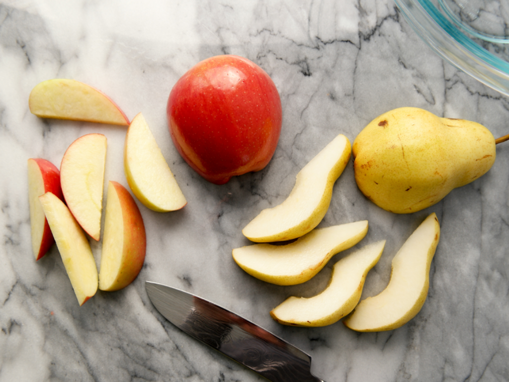 Sliced Apple and Pear on a Marble Countertop